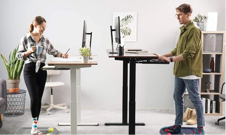 Want to feel more comfortable and happy at work? An adjustable desk is the solution